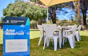 Outdoor shaded area with reserved sign